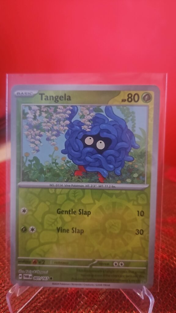 Reverse Holo Tangela 1/167 from Pokémon TCG Twilight Masquerade with silver border and reflective parallel foil.