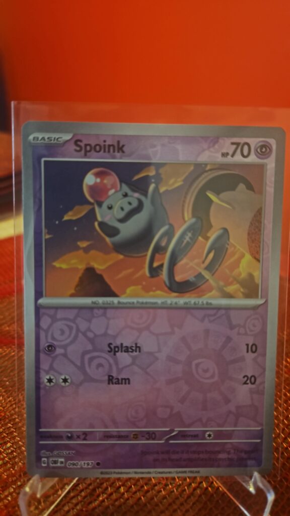 Spoink Reverse Holo Pokémon card from Pokémon TCG Obsidian Flames, illustrated by Shibuzoh., shown in Near Mint condition with reflective parallel‑foil background.
