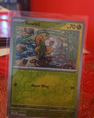 Rowlet 13/197 Reverse Holo NM Scarlet & Violet (Obsidian Flames) Pokemon Card
