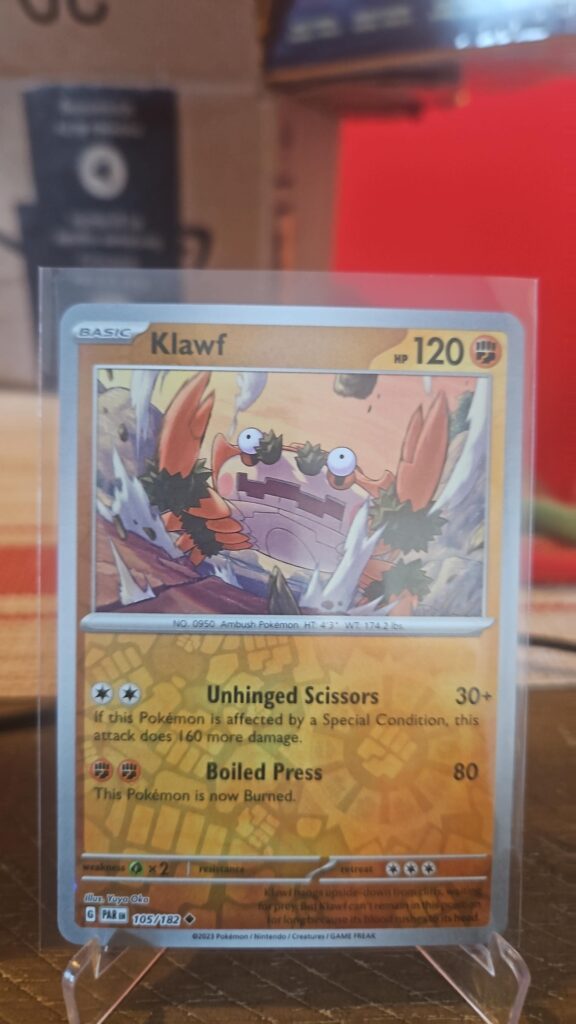 Klawf 105/182 Reverse Holofoil uncommon single card from Pokemon TCG Scarlet & Violet Paradox Rift set