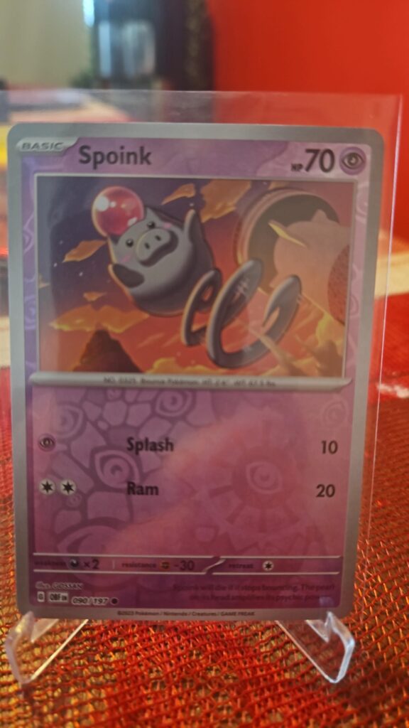 Spoink 90/197 Reverse Holo Pokémon card from Pokémon TCG Obsidian Flames, illustrated by Shibuzoh., shown in Near Mint condition with reflective parallel‑foil background.