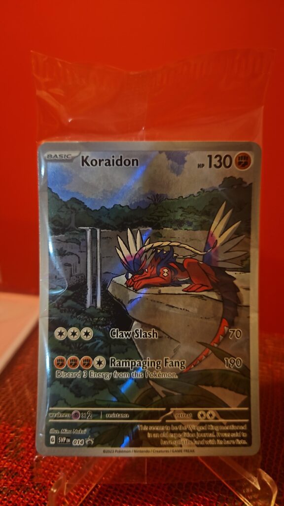 Pokémon TCG Koraidon 014 Black Star Promo SVP14 Holo card from Scarlet & Violet displayed in near mint/mint condition, showcasing detailed holo design and official promo branding for collectors.