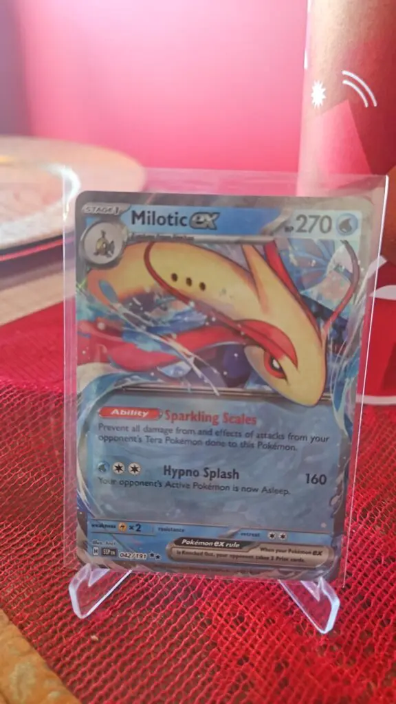 Pokémon TCG Milotic ex 42/191 Surging Sparks Double Rare card displayed in near mint condition, showcasing graceful illustration, exclusive double rare design, and collectible finish for fans.