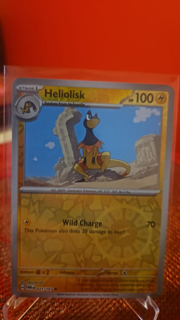 Reverse Holo Heliolisk 71/167 from Pokémon TCG Twilight Masquerade with silver border and reflective foil.