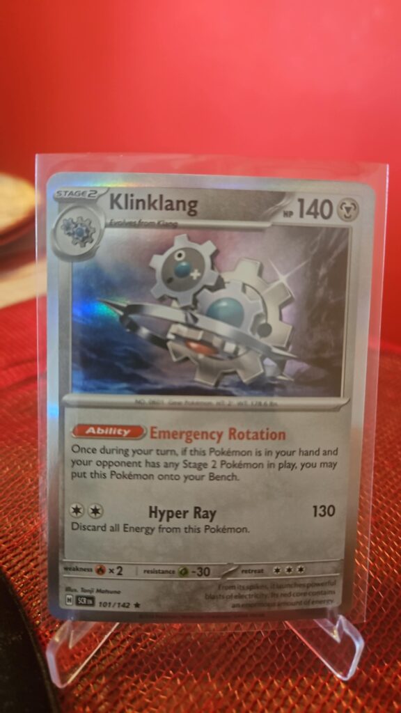 Klinklang 101/142 Stellar Crown Holo Rare Pokemon Card TCG