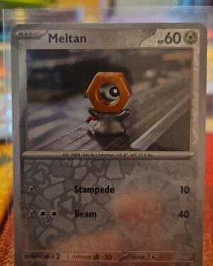 Meltan 102/142 Reverse Holo Pokemon TCG: Stellar Crown Near Mint
