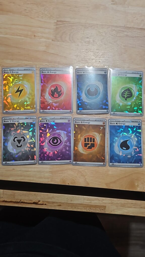 Cracked Ice Holo Energy Set of 8 from the Terapagos ex Ultra Premium Collection, featuring all basic Pokémon energies in a dazzling cracked ice foil pattern, perfect for collectors and competitive TCG players.