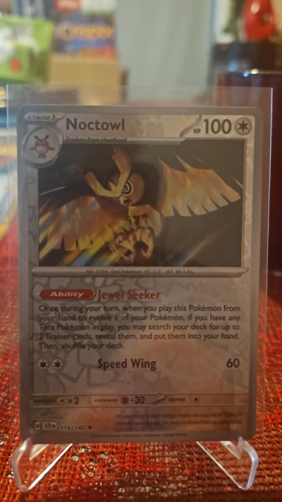2024 Noctowl 115/142 Reverse Holo Rare Pokémon card from Stellar Crown displayed in NM condition.