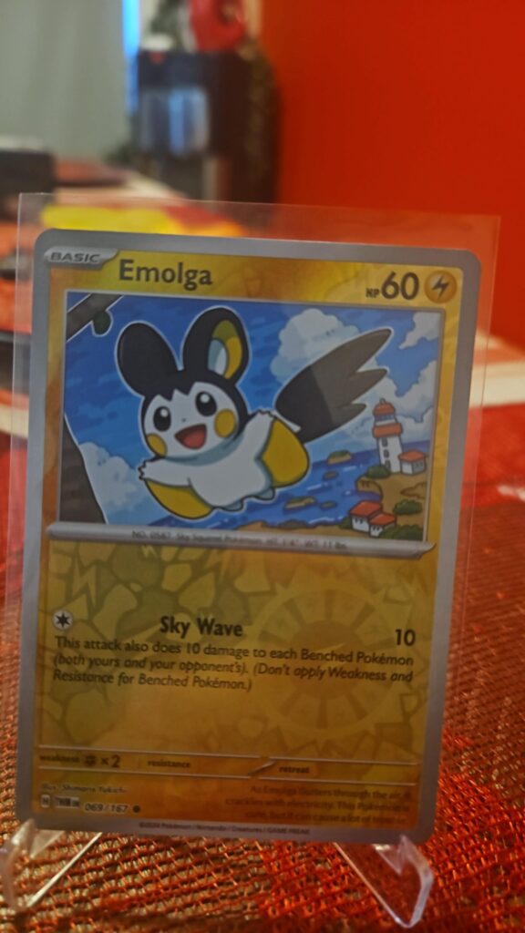 Reverse Holo Emolga 69/167 from Pokémon TCG Twilight Masquerade with silver border and reflective parallel foil.
