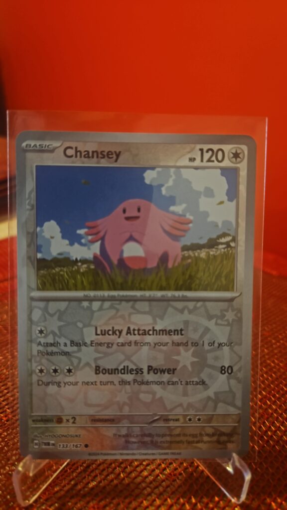 Reverse Holo Chansey 133/167 from Pokémon TCG Twilight Masquerade with silver border and reflective foil.