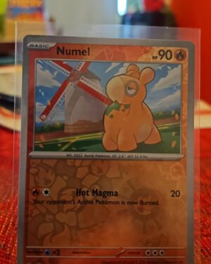 Pokemon TCG 2023 Obsidian Flames Numel 31/197 Reverse Holo mint condition card featuring Fire type and holofoil finish