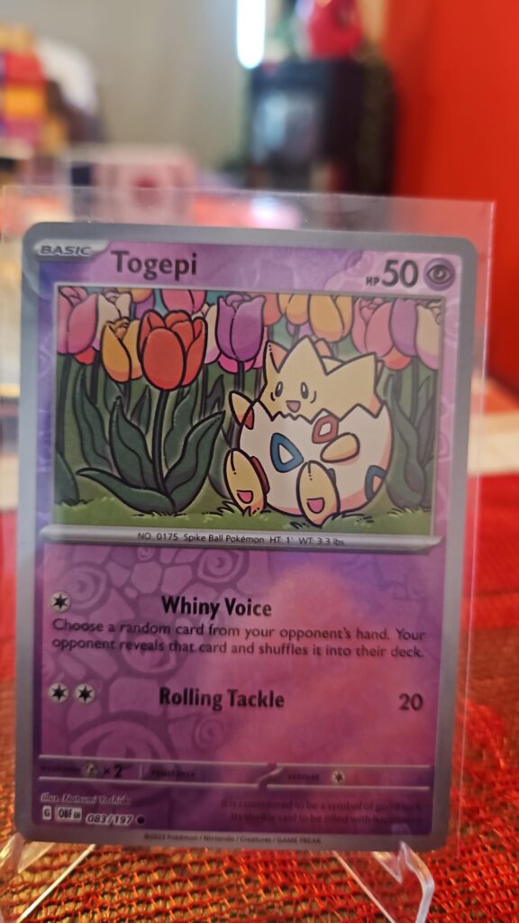 Togepi Reverse Holo Pokémon card from Scarlet and Violet Obsidian Flames, Near Mint