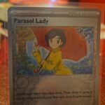 Parasol Lady 169/182 Reverse Holo Paradox Rift Pokemon tcg Card