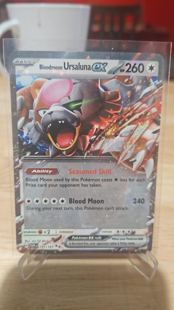 Pokémon TCG Ursaluna EX 141/167 Twilight Masquerade card displayed in near mint condition, showcasing powerful Ursaluna illustration, exclusive EX design, and collectible finish for fans.
