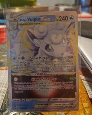 Pokémon TCG Alolan Vulpix VSTAR 34/195 Silver Tempest Ultra Rare card displayed in near mint condition, showcasing magical VSTAR illustration, exclusive ultra rare design, and collectible finish for fans.
