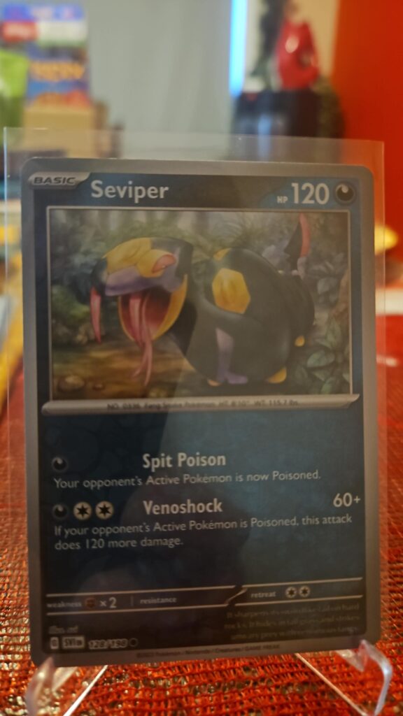 2023 Seviper 128/198 Reverse Holo Pokémon card from Scarlet & Violet Base Set displayed in Near Mint condition.