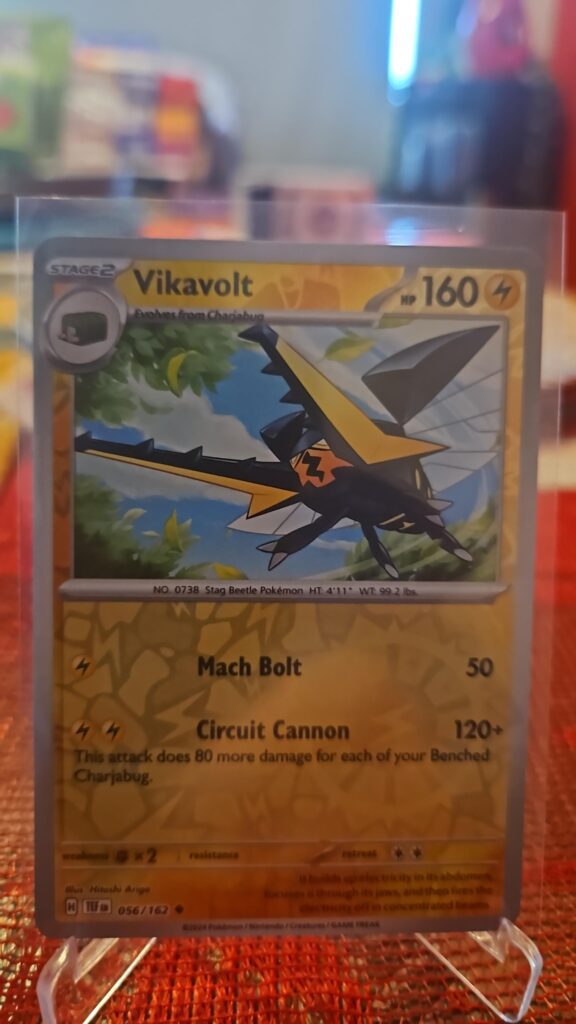 Vikavolt 56/162 Reverse Holo Pokémon card from Scarlet and Violet Temporal Forces, illustrated by GOSSAN, shown in Near Mint condition with reflective parallel‑foil background.
