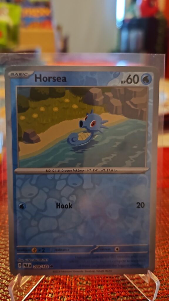 2023 Horsea 30/182 Reverse Holo Pokémon card from Paradox Rift displayed in Near Mint condition.