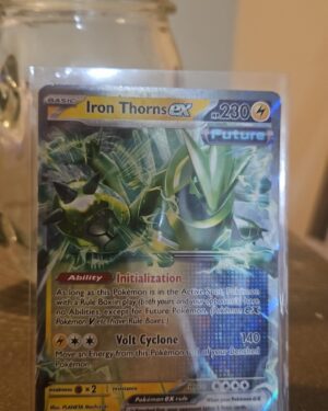 Iron Thorns ex 77/167 Double Rare card from Twilight Masquerade, featuring dynamic artwork and vibrant holo finish.
