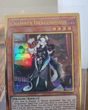Yu-Gi-Oh! Chamber Dragonmaid MGED-EN022 Gold Rare 1st Edition card, collectible gold finish, highly sought after by Dragonmaid and TCG fans