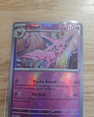 Pokémon TCG Espeon Poké Ball 033/131 Prismatic Evolutions card displayed in near mint condition, showcasing detailed Poké Ball-themed illustration for collectors.