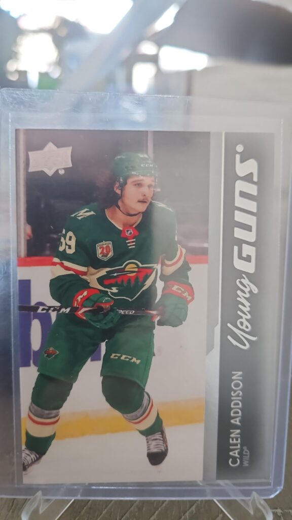 Calen Addison 2021-22 Upper Deck Series 1 Young Guns #227 rookie card, a prized collectible for Minnesota Wild fans.