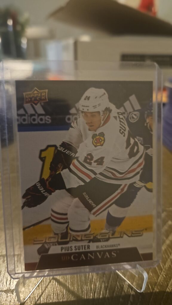 Pius Suter 2020-21 Upper Deck Series 2 Young Guns Canvas #C223 rookie card, a prized collectible for Chicago Blackhawks fans.