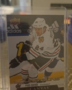 Pius Suter 2020-21 Upper Deck Series 2 Young Guns Canvas #C223 rookie card, a prized collectible for Chicago Blackhawks fans.