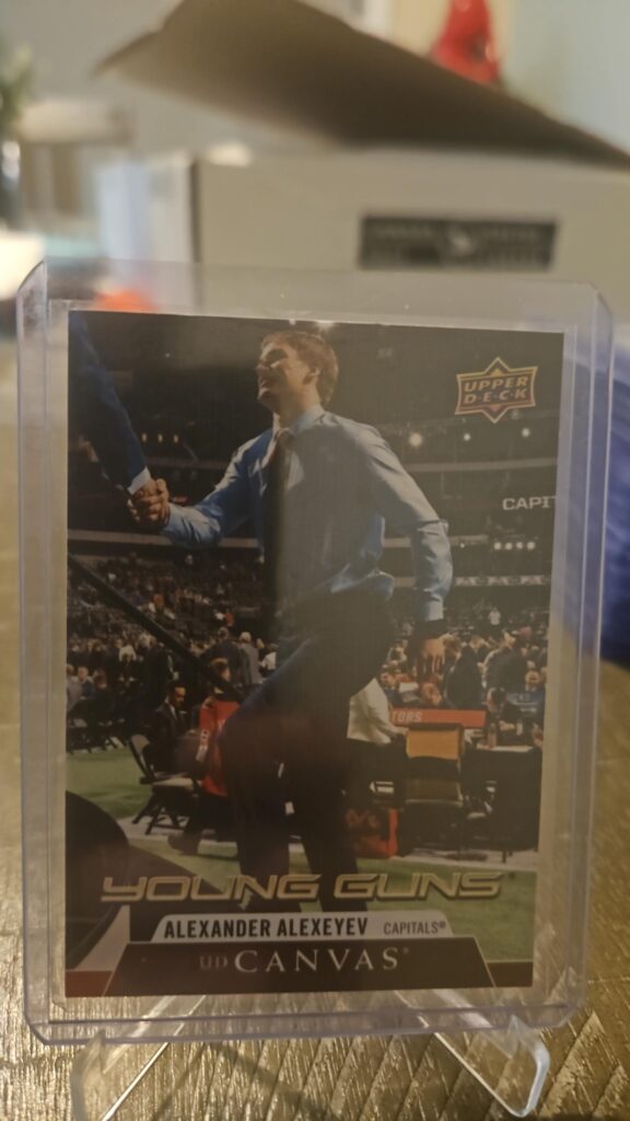 Alexander Alexeyev 2020-21 Upper Deck Series 2 Young Guns Canvas #C116 rookie card, a prized collectible for Washington Capitals fans.