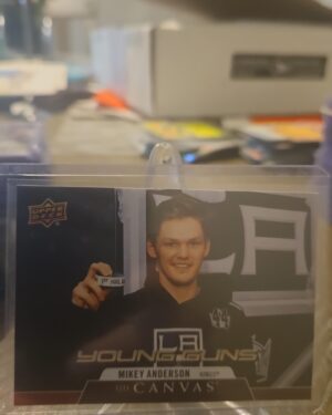 Mikey Anderson 2020-21 Upper Deck Series 2 Young Guns Canvas #C117 rookie card, a prized collectible for Los Angeles Kings fans.