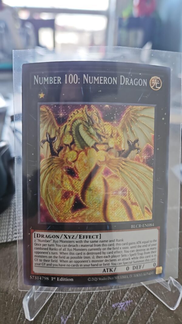 Yugioh Number 100: Numeron Dragon BLCR-EN084 Secret Rare 1st Edition Near Mint