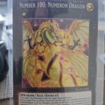 Yugioh Number 100: Numeron Dragon BLCR-EN084 Secret Rare 1st Edition Near Mint