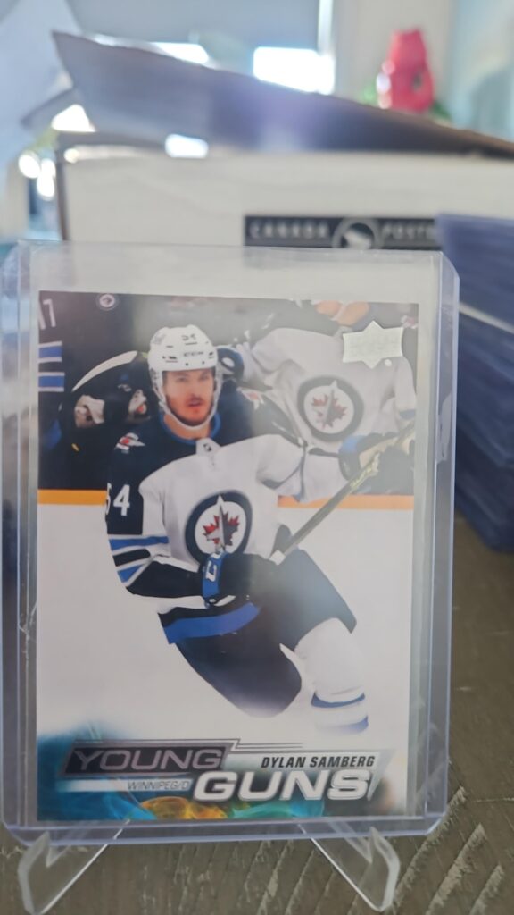 Dylan Samberg 2022-23 Upper Deck Series 1 Young Guns #233 rookie card, a prized collectible for Winnipeg Jets fans.