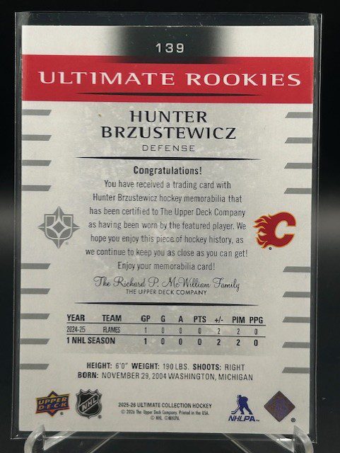 Back view of 2025-26 Upper Deck Ultimate Collection Hunter Brzustewicz rookie jersey hockey card showing stats and serial number out of 499
