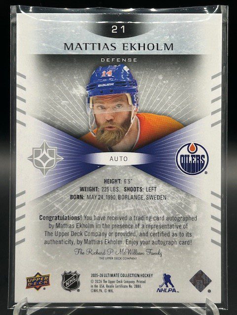 Back view of 2025-26 Upper Deck Ultimate Collection Mattias Ekholm autograph hockey card number 21 showing player stats