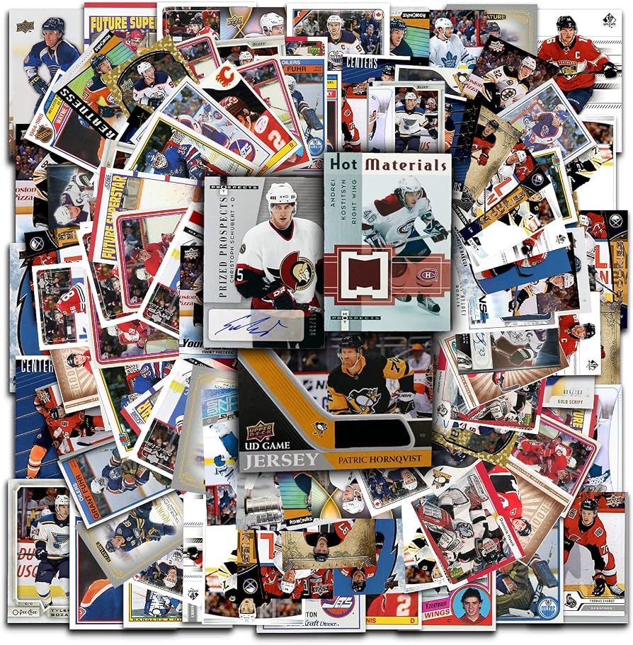 A detailed desktop spread displaying premium hockey trading card boxes, protective card slabs, and open packs with recent rookie inserts.