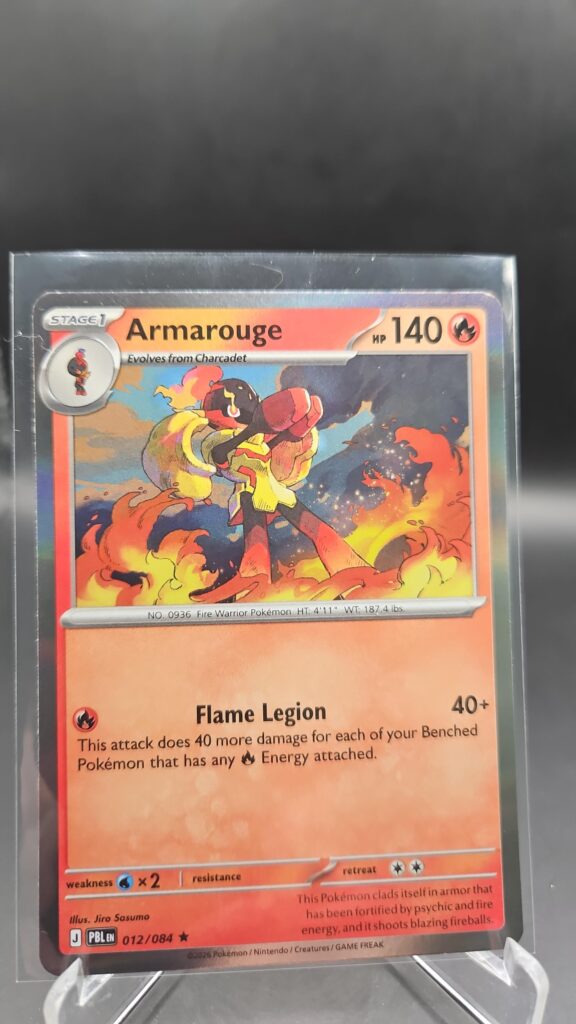 Armarouge 012/084 Rare Holo Pokémon card from Pitch Black ME05 in Near Mint condition.