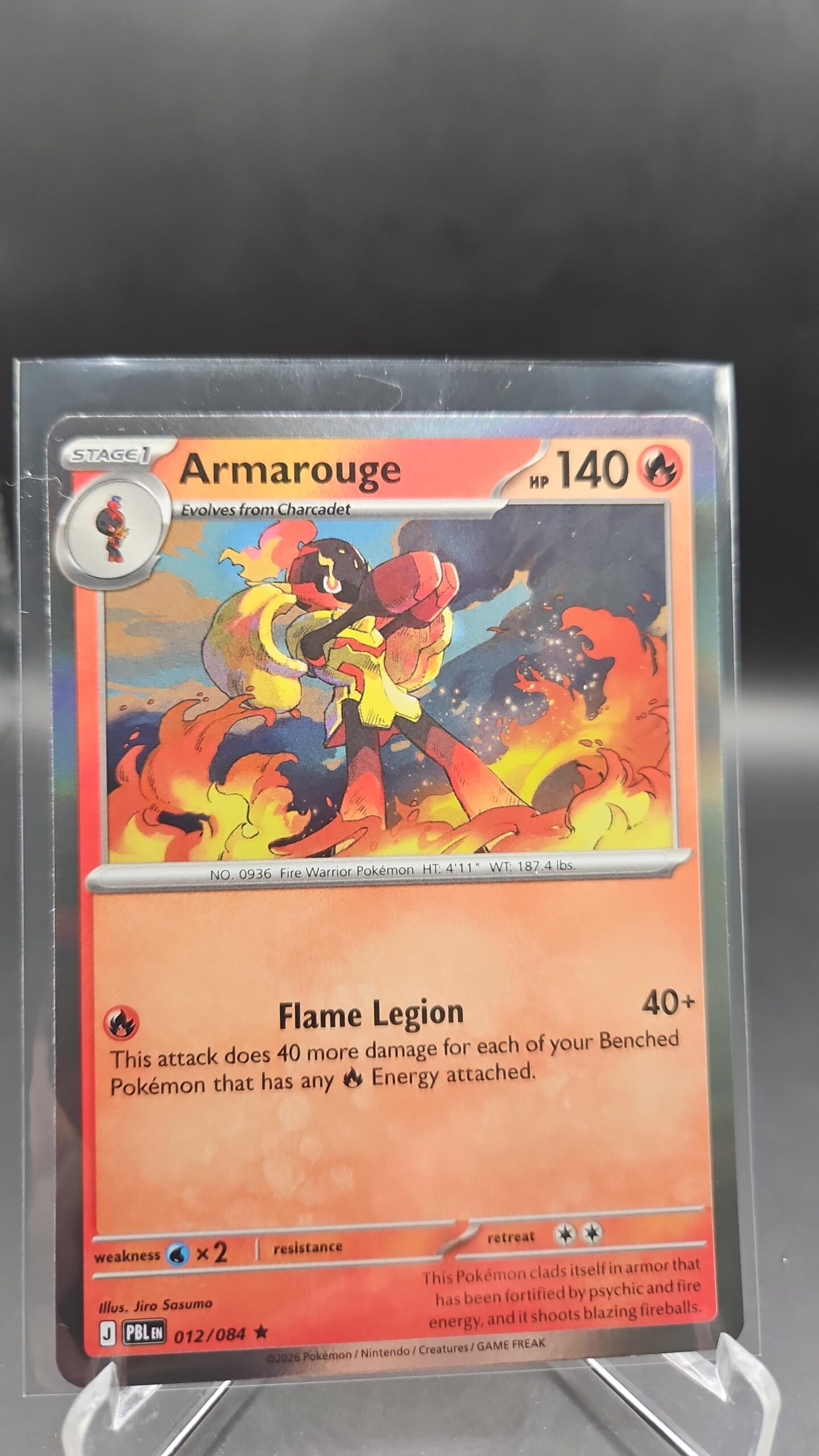 Armarouge 012/084 Rare Holo Pokémon card from Pitch Black ME05 in Near Mint condition.