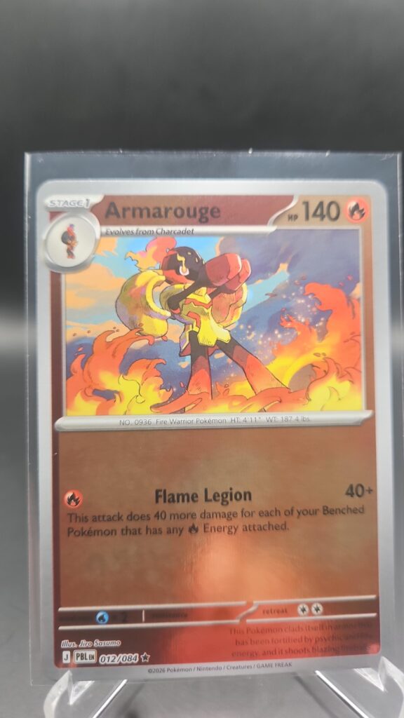 Armarouge 012/084 Reverse Holo Pokémon card from Pitch Black ME05 in Near Mint condition.