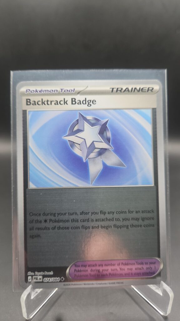 Backtrack Badge 074/084 Reverse Holo Pokémon card from Pitch Black ME05 in Near Mint condition.