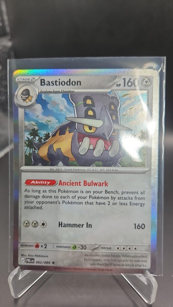Bastiodon 062/084 Rare Holo Pokémon card from Pitch Black ME05 in Near Mint condition.