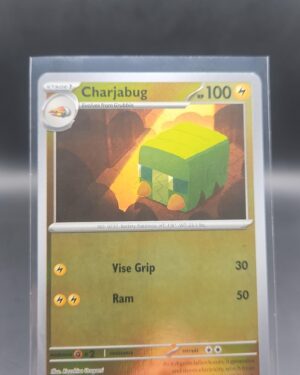 Charjabug 025/084 Reverse Holo Pokémon card from Pitch Black ME05 in Near Mint condition.