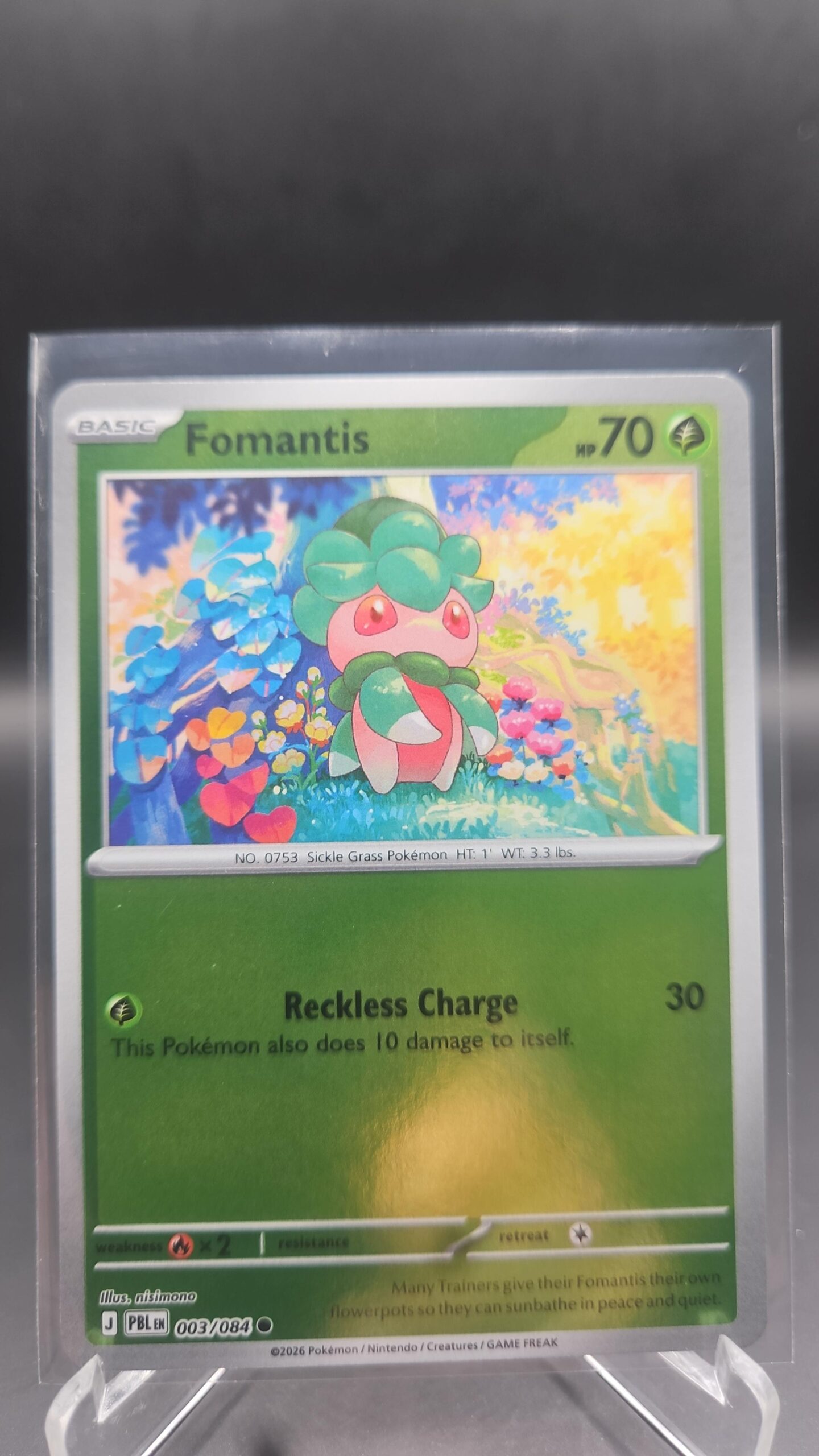 Fomantis 003/084 Reverse Holo Pokémon card from Pitch Black ME05 in Near Mint condition.