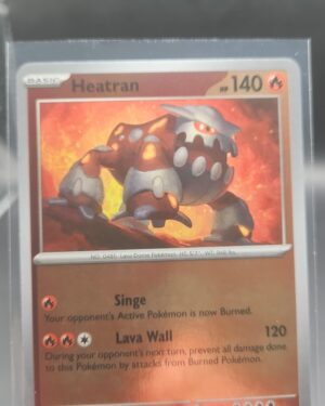 Heatran 007/084 Reverse Holo Pokémon card from the Mega Evolution Era Pitch Black ME05 set in Near Mint condition.