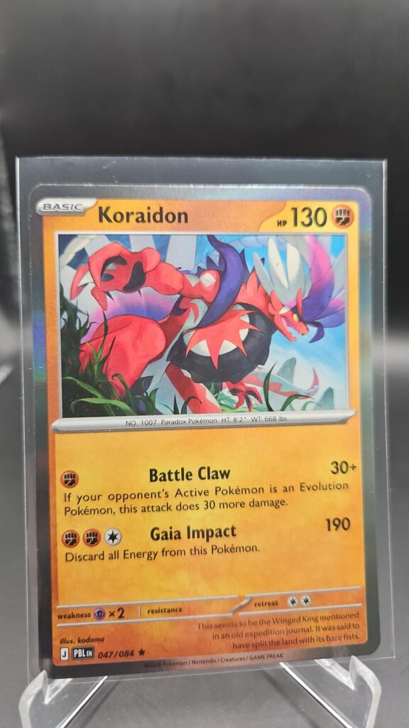 Koraidon 047/084 Rare Holo Pokémon card from Pitch Black ME05 in Near Mint condition.