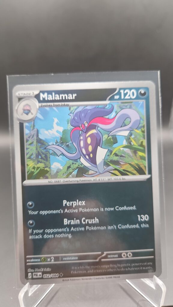 Malamar 052/084 Reverse Holo Pokémon card from Pitch Black ME05 in Near Mint condition.
