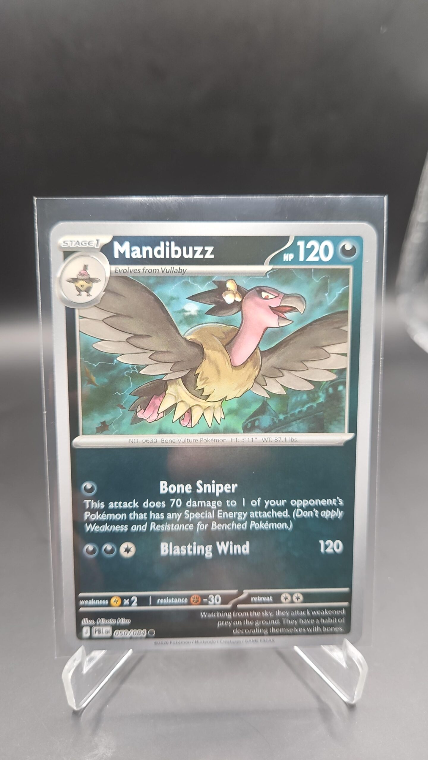 Mandibuzz 050/084 Reverse Holo Pokémon card from Pitch Black ME05 in Near Mint condition.