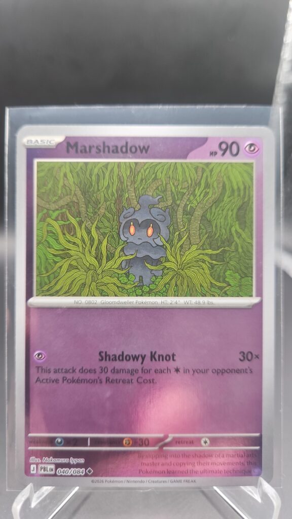 Marshadow 040/084 Reverse Holo Pokémon card from the Mega Evolution Era Pitch Black ME05 set in Near Mint condition.