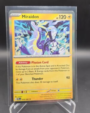 Miraidon 028/084 Rare Holo Pokémon card from Pitch Black ME05 in Near Mint condition.