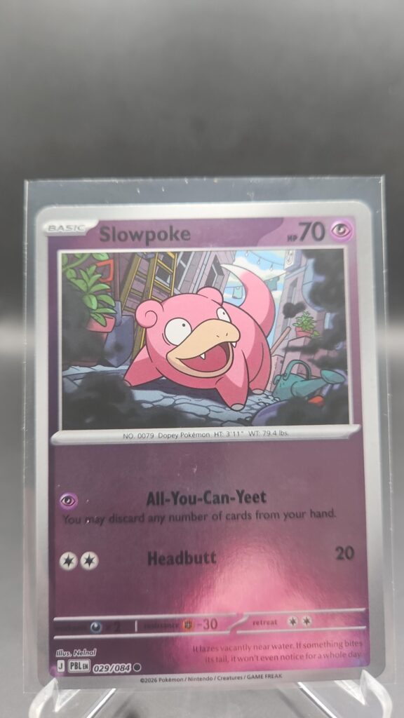 Slowpoke 029/084 Reverse Holo Pokémon card from Pitch Black ME05 in Near Mint condition.